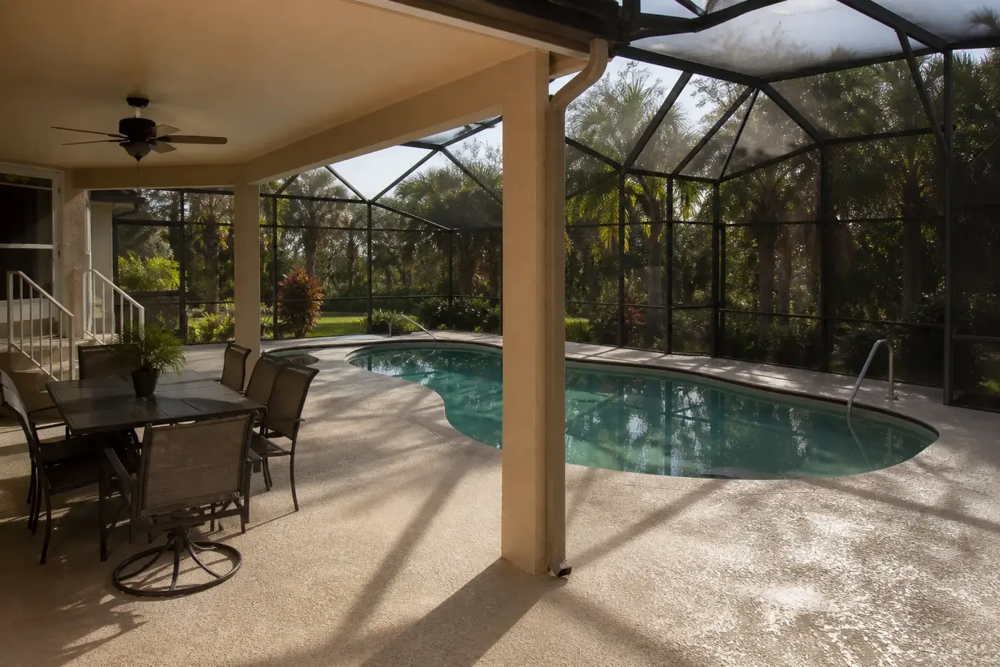 Covered lanai and rubber pool deck at a Pembroke Pines home